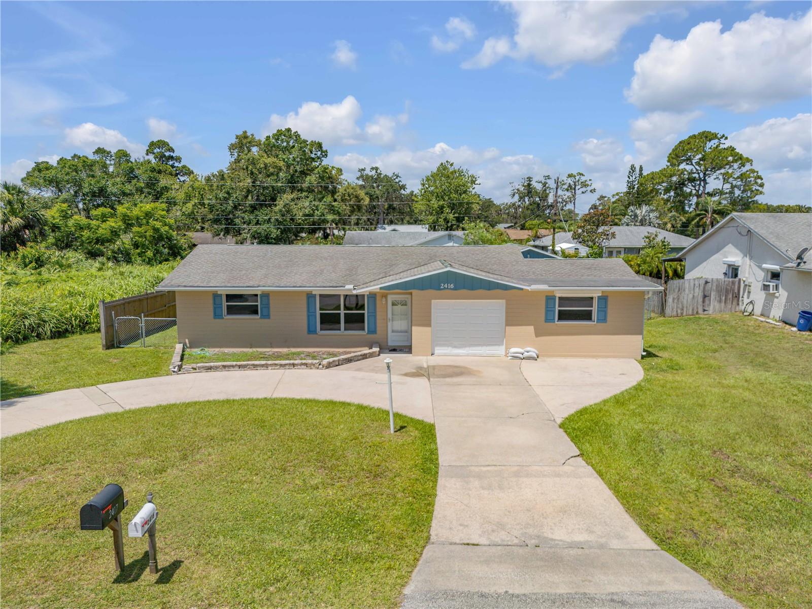 2416 PINE TREE DRIVE