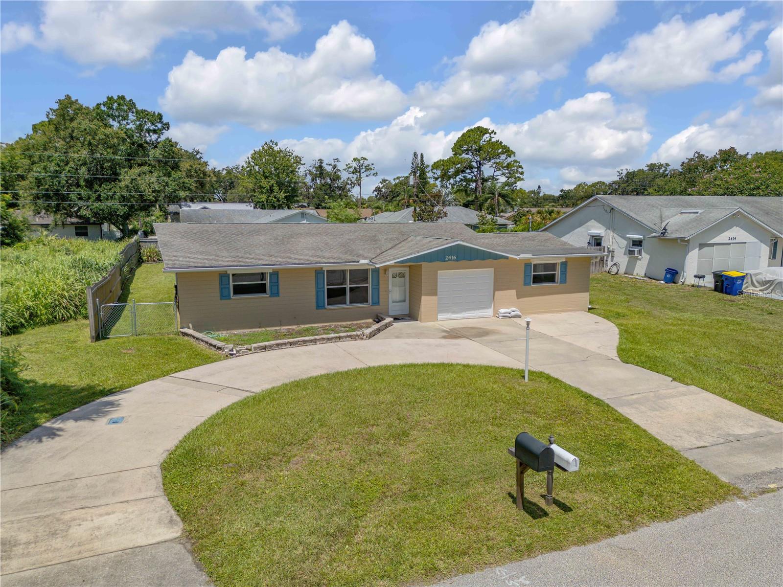 2416 PINE TREE DRIVE