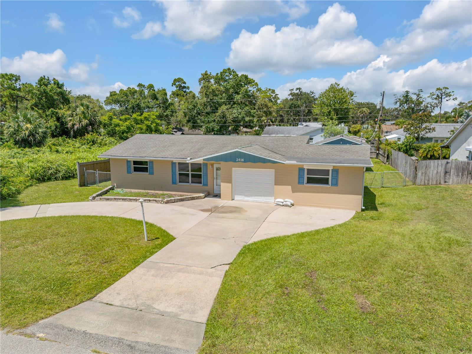 2416 PINE TREE DRIVE