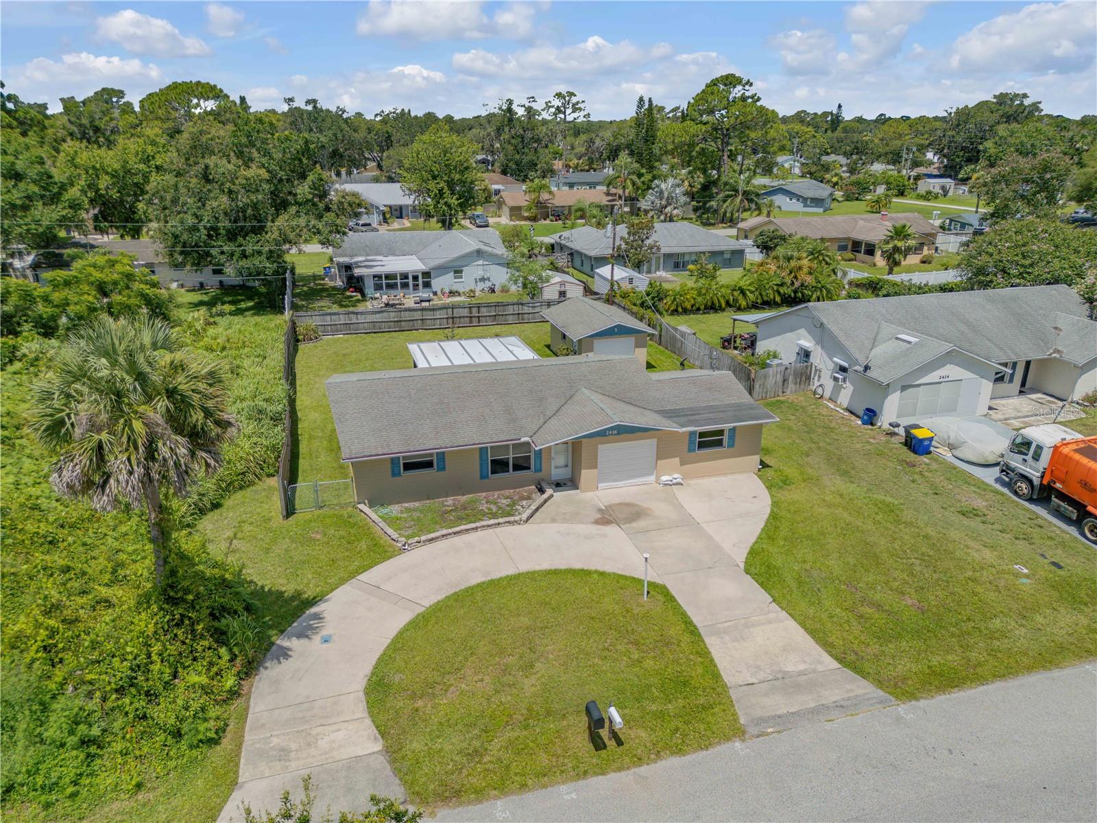 2416 PINE TREE DRIVE