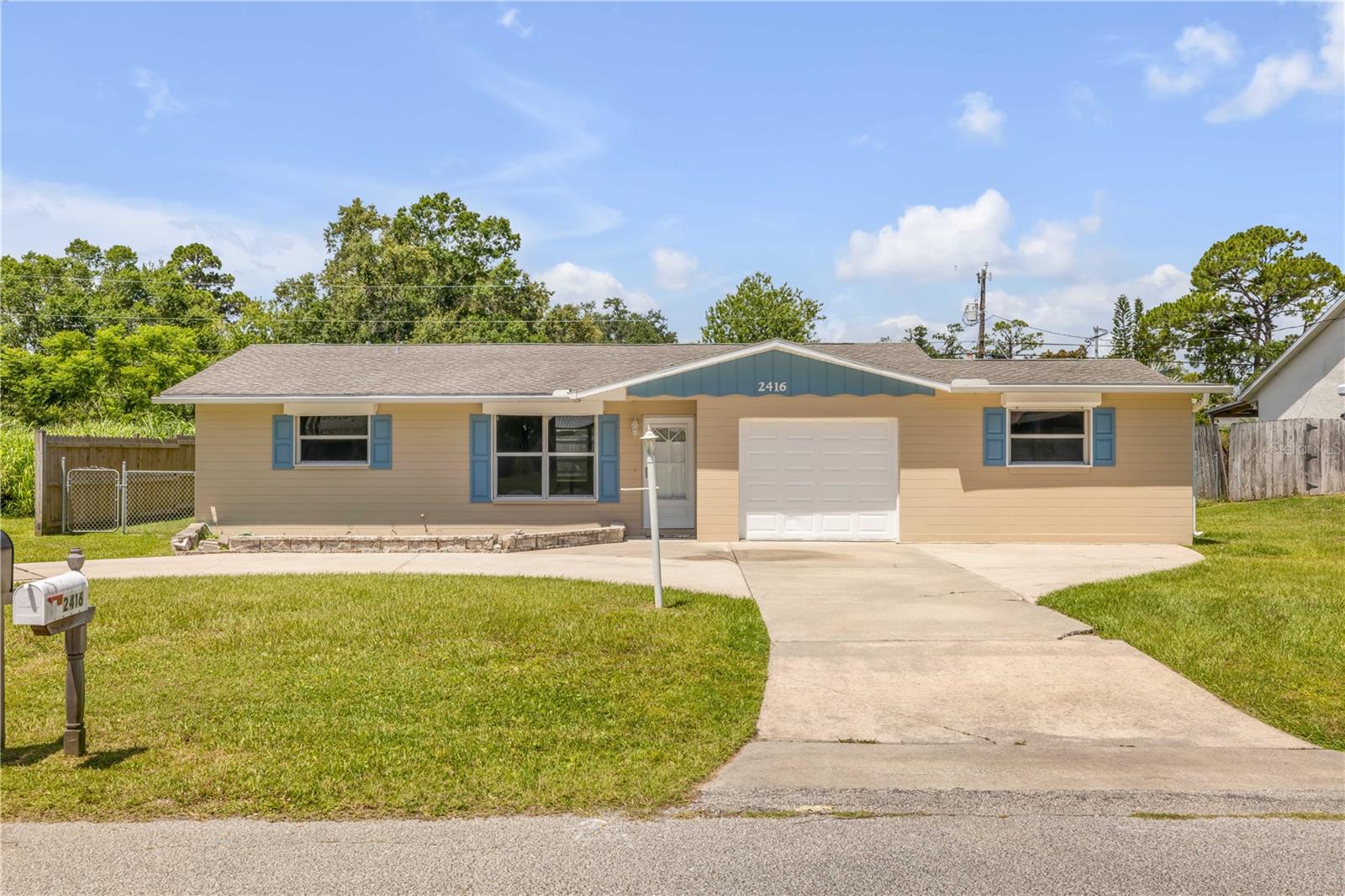 Welcome to Your Florida Shores Retreat!
This charming 3-bedroom, 2-bath home sits on an oversized lot and offers an unbeatable combination of space, functionality, and location — all at an attractive price point!
Step inside to discover a split open floor plan that’s ready for your personal touch. Whether you're a first-time buyer, investor, or someone looking to make a space your own, this home is full of potential.
Outside, a large circular driveway provides ample parking, and the property features not one but two garages — an attached garage and a detached one, perfect for storing your boat, tools, or weekend toys.
Enjoy summer evenings on the huge screened-in back porch, ideal for backyard BBQs, entertaining, or relaxing in the shade.
Conveniently located just minutes from downtown New Smyrna Beach, Daytona, and a short drive to Orlando, this is the perfect location to create your forever home or your next investment opportunity.
Don’t miss out — schedule your private showing today and imagine the possibilities!