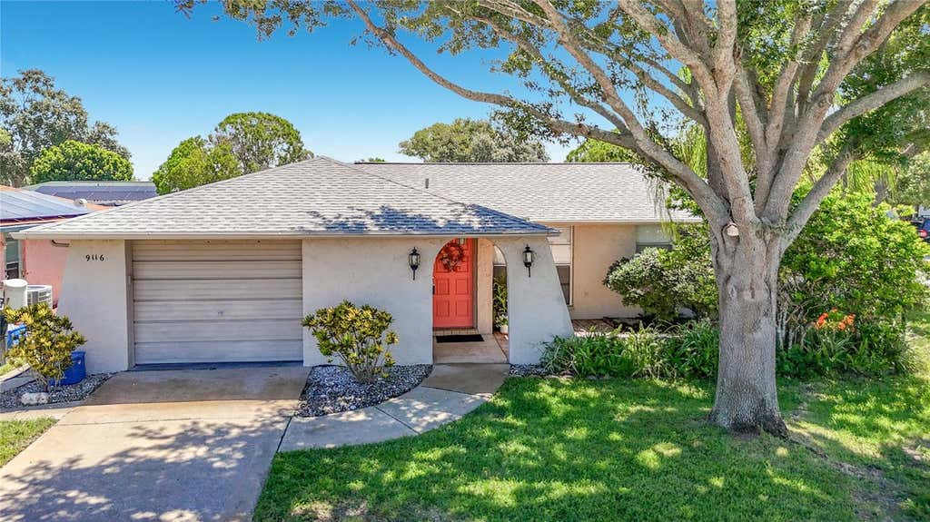 Photo of 9116 Farmington Lane, Port Richey, FL 34668 (MLS # W7888327)