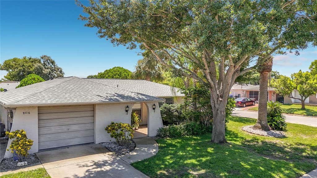Photo of 9116 Farmington Lane, Port Richey, FL 34668 (MLS # W7888327)