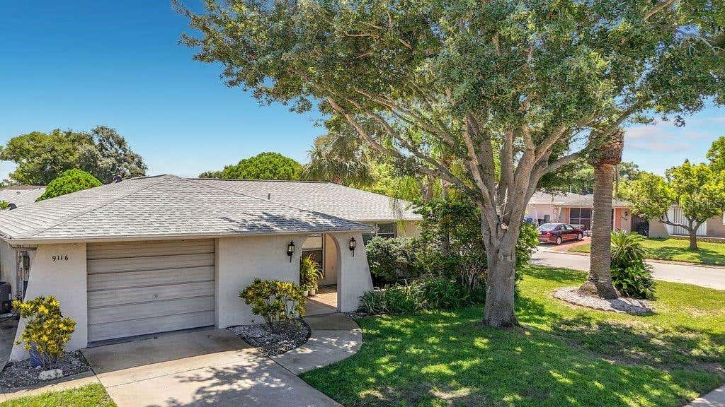 Photo of 9116 Farmington Lane, Port Richey, FL 34668 (MLS # W7888327)