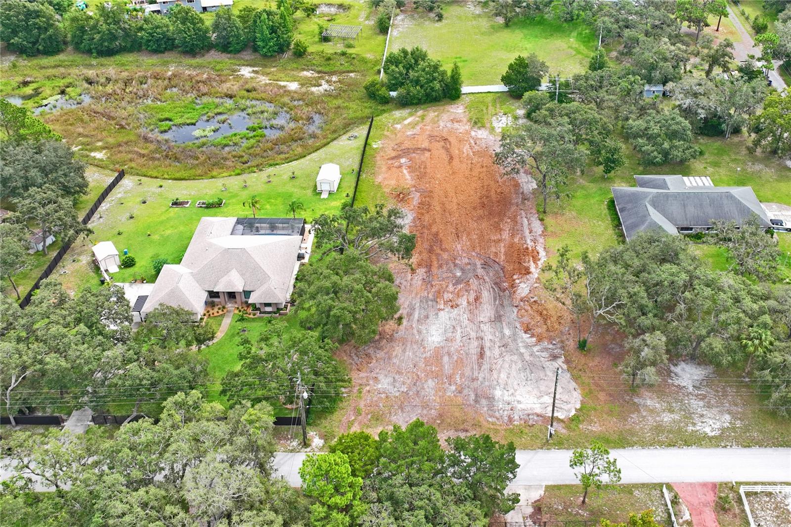The perfect lot located in the sought out community of Oak Lake Ranchettes, would be perfect to build your dream home. This piece of land also features water views. Imagine building your dream home and having enough room for a pool, entertainment space, and more. The opportunities are endless. This vacant piece of property sits on just over an acre of land. Location is absolutely perfect as its close to major highways, hospitals, grocery stores, restaurants and more. Lot is clear and ready for its next owners. Call today to get more information on how to make this your next purchase. Ask about me more about financing options that could be available to you!