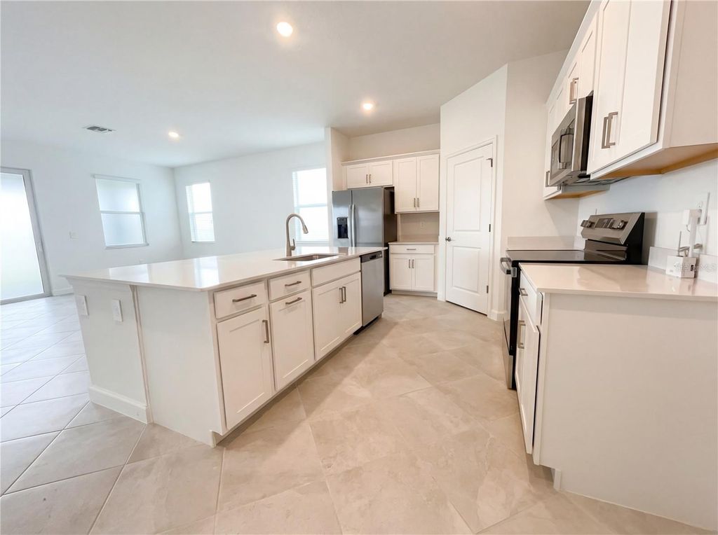 Photo of 7863 Lakes Edge Lane, Port Charlotte, FL 33981 (MLS # O6382630)