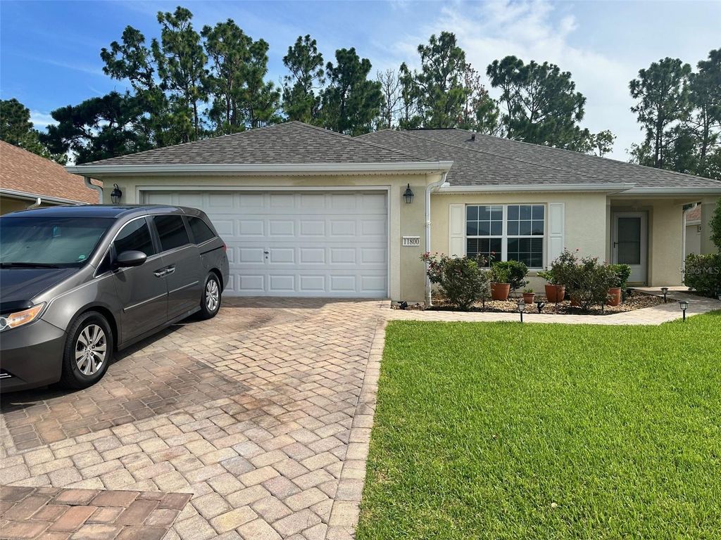 Photo of 11800 SE 91st Circle, Summerfield, FL 34491 (MLS # OM706841)