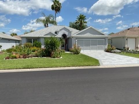 Designer home with many upgrades. Stucco finish. 1657 f/f. Built 1999. Central air, double paned windows, marble windowsills, 2 car garage, Lanai, patio, extensive garden features, new luxury vinyl tile throughout, HVAC, roof and appliances less than 6 years, Extensive list of upgrades and replacements. Contact Sharon Grodzicki for a complete list of all of the home's features.
