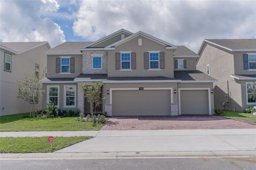 Step into a Lifestyle of Unrivaled Luxury in Your Brand New, Never-Lived-In Executive Home at Hanover Lakes! Nestled within the pristine Hanover Lakes community, this expansive 3800 sq ft masterpiece of a home offers more than just living space; it presents an unparalleled living experience. As you walk through the elegant foyer, you'll be greeted by the sheer grandeur of this residence, meticulously designed for modern comfort and timeless sophistication. With 5 spacious bedrooms, including a master suite that's a retreat unto itself with its spa-like en-suite and abundant walk-in closet space, and 3.5 luxurious bathrooms, this home embodies the epitome of lavish living. What truly sets this residence apart is its status as a never-lived-in gem. Imagine the joy of being the first to call this exquisite abode home, where every surface sparkles with newness, and every corner exudes the scent of fresh beginnings. The gourmet kitchen, a culinary enthusiast’s dream, boasts state-of-the-art appliances and opens into the expansive living spaces, making it perfect for both family gatherings and grand entertaining. Beyond the allure of your brand new home lies the enchanting Hanover Lakes community itself. Here, the beauty of Florida’s outdoors is not just a view, but a way of life. Your backyard boat docks offer serene moments by the water, while the nearby Alligator Chain of lakes provides endless opportunities for fishing and nature exploration. Dive into the refreshing waters of the resort-style pool, or let the little ones frolic in the splash pad. Hanover Lakes is not just a community; it's a vibrant, friendly neighborhood where families connect, and lifelong friendships are forged. Convenience meets adventure in this coveted community. Enjoy easy access to the world-famous attractions like Disney World Resort and Universal Studios Florida, all within a short drive. The Atlantic Beaches beckon for weekend getaways, and downtown Orlando’s cultural venues are readily accessible through nearby expressways. This home isn't just a residence; it’s a testament to your success and a promise of a brilliant future. Make this brand new, never-lived-in home your own sanctuary. For inquiries and private tours, make an appointment today to see this beauty before it's gone. Your journey to luxurious, brand-new living in the heart of Hanover Lakes begins now!