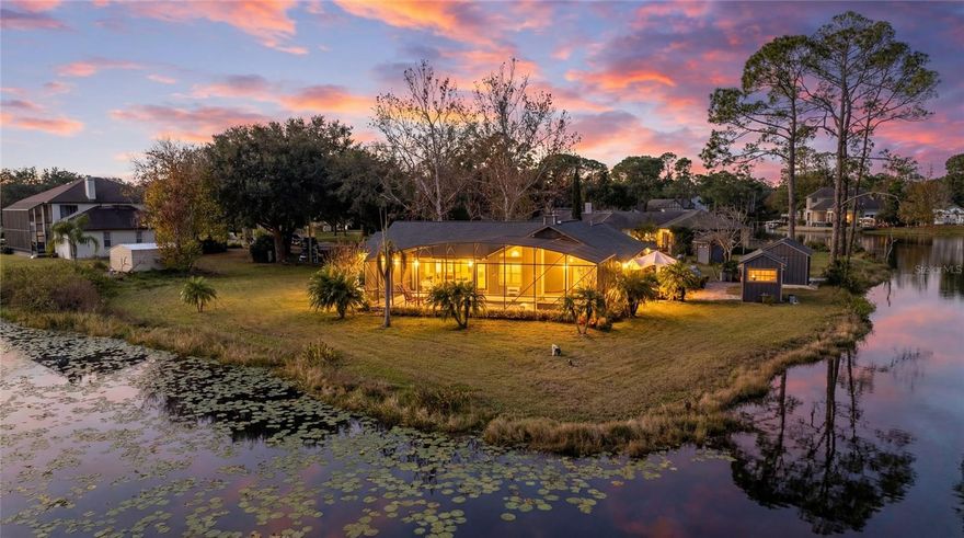 This rare pool home on a tip lot offers something you almost never find—water on two sides with sweeping views of beautiful Lake Markham, one of Seminole County’s most sought-after lakes known for its calm waters, boating, and peaceful natural setting. With 4.39 acres of property (approximately .7 acres of dry land and the rest lake ownership) and no HOA, this is a truly special opportunity.

The home’s unique architectural style shines with slanted ceilings, many windows, cedar accents, and open spaces full of natural light. Inside, you’ll find a living room with a striking wood-accent, wood-burning fireplace, a separate dining area, a family/sitting room overlooking the lake, and an office wrapped in windows. With 2 bedrooms, 2 upgraded bathrooms, and flex space that can easily serve as a third bedroom, this home offers comfort and versatility.

The primary suite feels like a private retreat with a spacious walk-in shower, double sinks, quartz countertops, and a separate entrance to the outside for added convenience. Throughout the home is easy-care LVP flooring and tile in the bathrooms.

From the many windows, enjoy views of the beautifully finished self -cleaning, salt-water, caged pool featuring a pebble finish and details perfectly placed to capture lake views. The property also includes a butler’s pantry with electricity and plumbing off the two-car garage, a top-of-the-line water filtration system, and a separate laundry room with a newer washer and dryer that convey.

Outside, the landscaped yard is easy to maintain, and the paver driveway adds an elegant touch. Follow the large wooden deck to two custom workshops (10ftX12ft) & (12ftx16ft), ideal for storage, hobbies, or projects. A brand-new roof (6/2025) completes the package.

You have to see this property in person to understand how rare and amazing it truly is. Homes like this simply do not come around often.