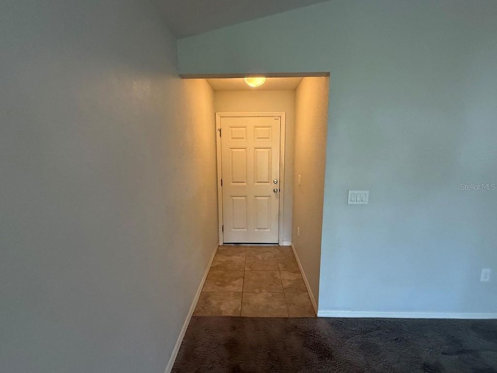 Photo of 1992 Bretton Ridge Way, Winter Haven, FL 33884 (MLS # O6376802)