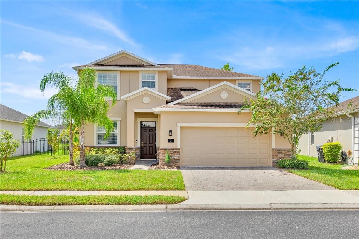 Welcome to this Amazing 4-bedroom, 3-bathroom pool home located in the coveted GATED COMMUNITY of Providence. This home is designed for relaxation and enjoyment, Fully fenced property with a water view, plus a screened-in saltwater pool and spa. This home offers the perfect combination of style and comfort, ensuring unforgettable moments in the Florida climate. Upon entering, you'll be greeted by a foyer and a formal living room to your left, with ceramic flooring throughout the main areas of the first floor. Down the foyer, you'll access an open-concept family room, kitchen, and dining area. The kitchen features 42" cabinets, stainless steel appliances, a pantry, and an island for easy meal prep. Stone countertops in the Kitchen and all bathrooms. One Bedroom and a full bathroom are conveniently located on the first floor., offering flexibility and accessibility for guests or family members who prefer single-story living. The first floor also features the laundry room near the two-car garage. The master suite is located on the second floor, along with two additional bedrooms and a large loft, offering a haven of peace and privacy upstairs. Downstairs, the open layout offers ample space for entertaining or simply relaxing. Sliding doors connect to outdoor living, providing access to the large covered porch for relaxing by the sparkling pool and spa, overlooking the pond. This home boasts other updates, such as new exterior and interior paint in 2025, gutters, and Fruit bearing trees & plants, including mangos, guava, bananas, persimmons, red cashew, avocado, and others. Underground water System installed for the sprinklers in 2023.
Located in the desirable, 24-hour guard-gated Providence Golf Club community, which offers residents luxurious resort-style amenities, Providence is a Davenport's hidden gem, the community was designed with family-friendly activities in mind. Amenities include a fully equipped fitness center, tennis courts, a resort-style pool, a lap pool, walking trails, a playground, a dog park, a restaurant, and much more to suit a variety of needs. The golf course is optional, making the HOA fees more affordable. If you'd like to explore the outskirts of the community, you'll find several restaurants, supermarkets, and grocery stores along Highway 17-92. Conveniently close to the Disney area, theme parks, shopping centers, and with quick access to freeways, whether you're looking for a permanent residence or a second home, this property offers the best of both worlds. Don't miss this opportunity. Schedule your private showing today before it's gone.