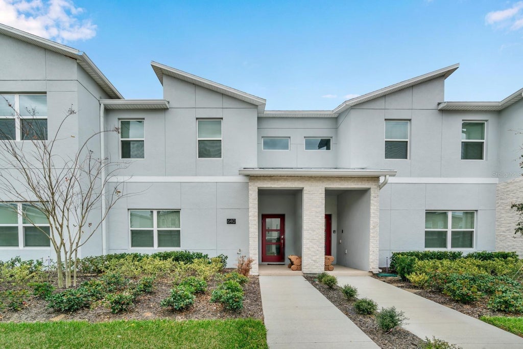 Photo of 640 Pebble Beach Drive, Davenport, FL 33896 (MLS # K4903577)