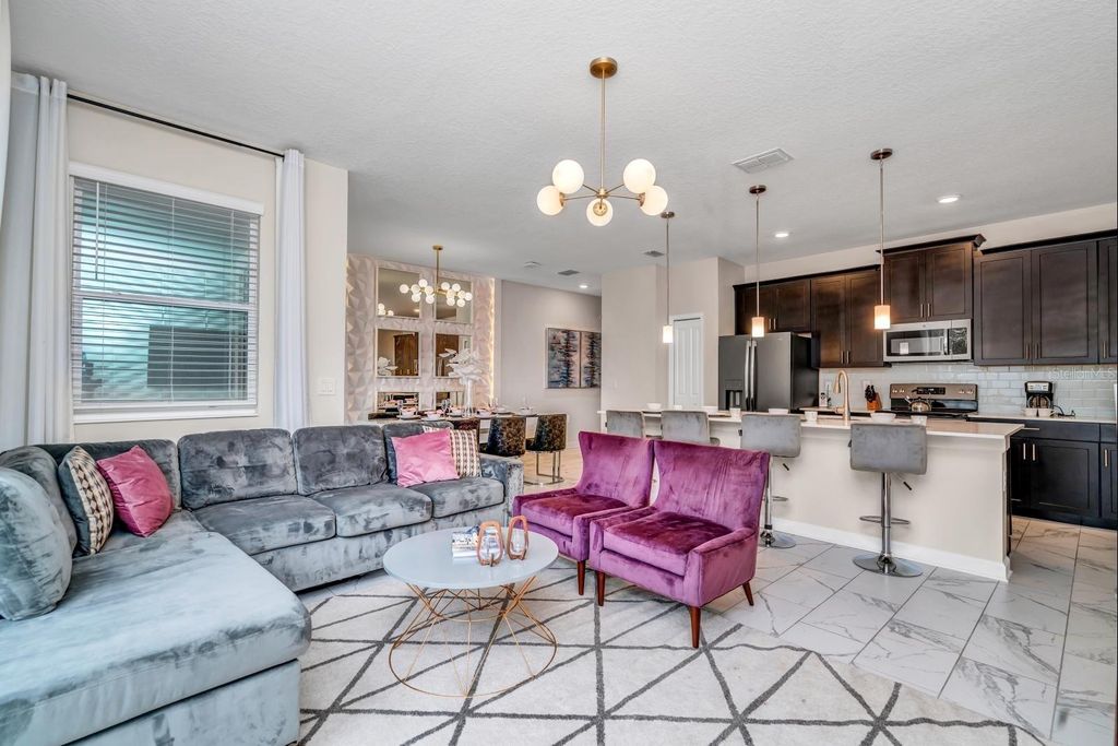 Photo of 640 Pebble Beach Drive, Davenport, FL 33896 (MLS # K4903577)