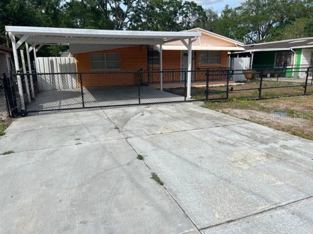 Photo of 2010 E Genesee Street, Tampa, FL 33610 (MLS # TB8457771)
