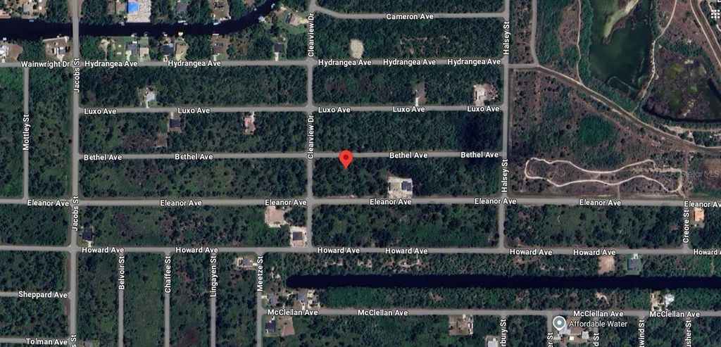 Photo of 14161 Bethel Avenue, Port Charlotte, FL 33953 (MLS # A4657244)