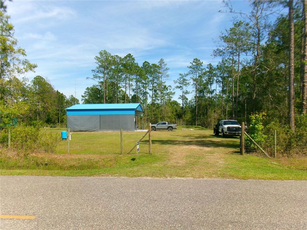Photo of 10220 Crotty Avenue, Hastings, FL 32145 (MLS # FC317470)