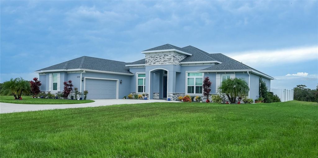 Photo of 5054 Lake Toscana Drive, Wimauma, FL 33598 (MLS # TB8410269)