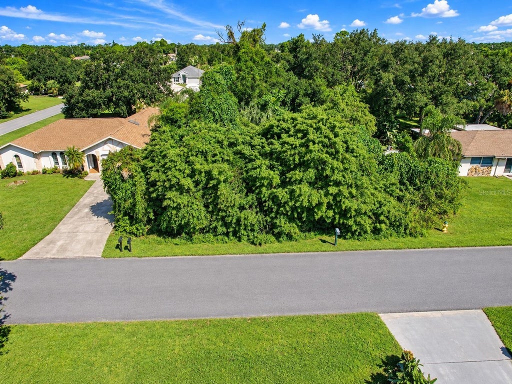 Photo of 21434 Beaverton Avenue, Port Charlotte, FL 33952 (MLS # C7531942)