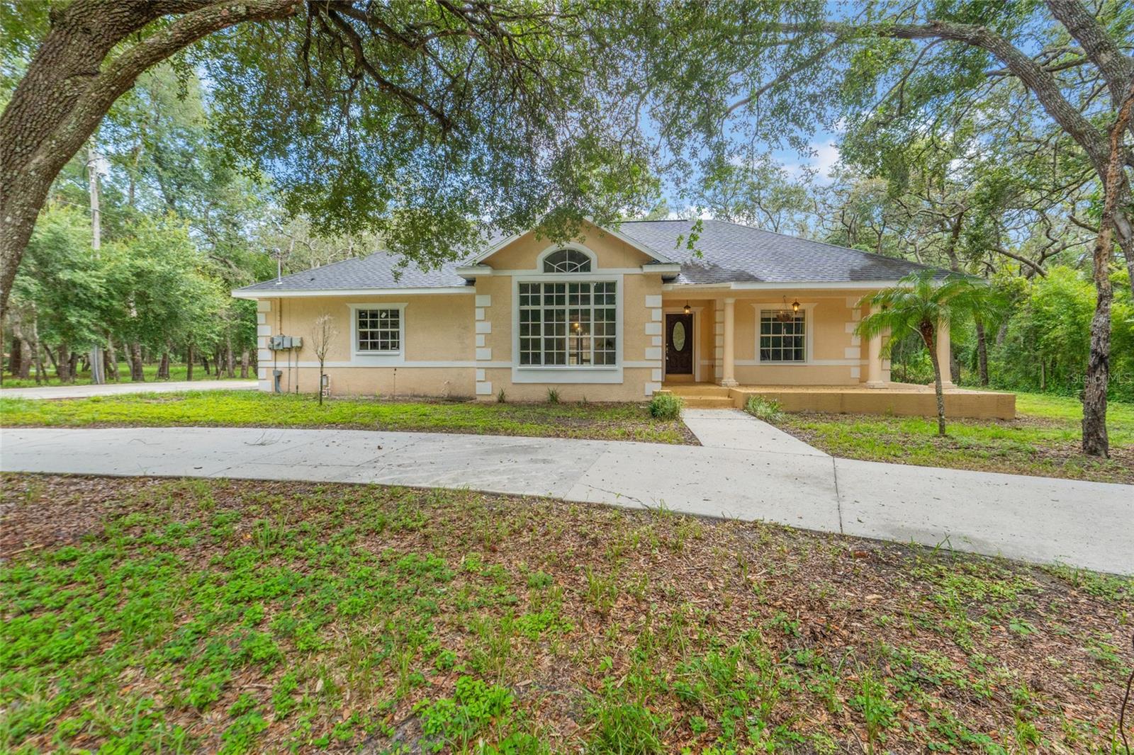 Endless Potential on Nearly 6 Acres! Discover the perfect blend of comfort and opportunity
with this 3-bedroom, 2-bath concrete block home nestled on 1.92 acres. This well-maintained
residence features a spacious 2-car garage, a large, detached garage/workshop with two roll-up
doors, and a fully fenced yard—ideal for privacy, pets, or hobby farming. Step inside to find a
bright and functional layout, complete with all appliances included. The open kitchen and dining
area lead to the back patio through beautiful French doors—perfect for relaxing or entertaining.
A dedicated laundry room with washer and dryer adds convenience to daily living. But there’s
more—this property is being sold together with an adjoining 3.85-acre fully fenced parcel,
offering even more possibilities. The additional acreage includes two mobile homes, both 3
bedrooms, 2 bathrooms. Both double wide, 1974 and 1996. Total for both properties
$630,000. Ideal for rental income, multigenerational living, or future development. Whether
you're looking for a quiet homestead, investment opportunity, or space to grow, this unique
offering has it all! Seller wants to sell both properties together.