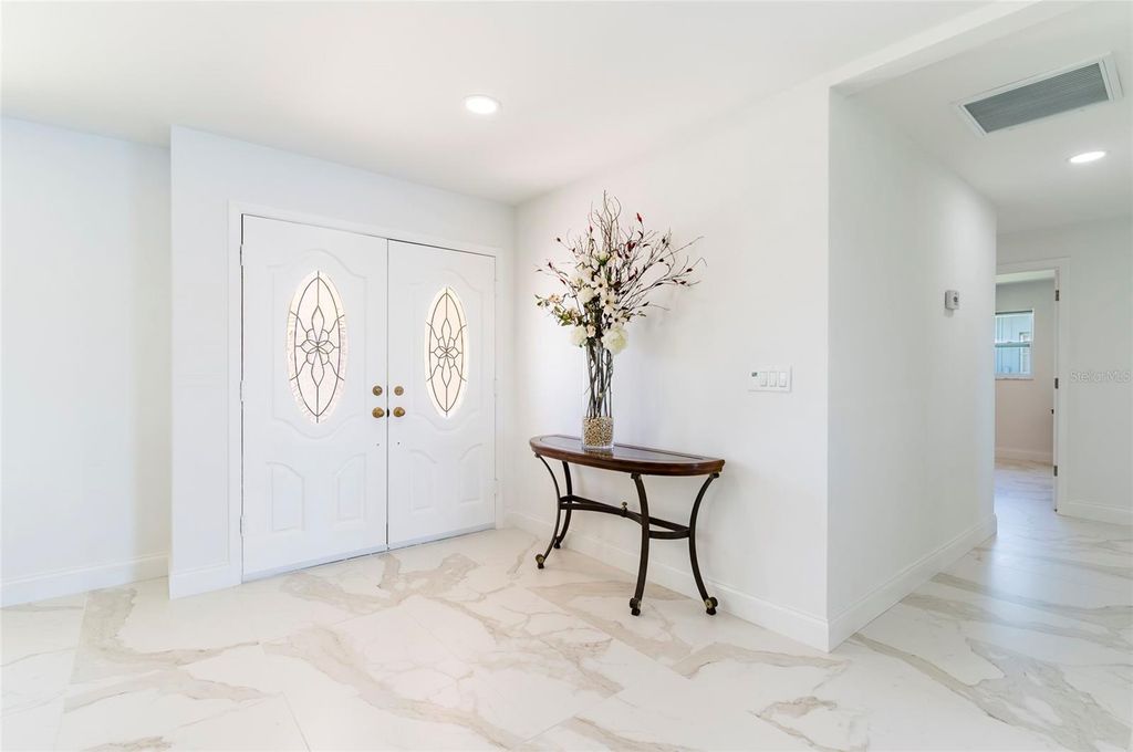 Photo of 13797 Pinecrest Drive, Largo, FL 33774 (MLS # TB8467510)