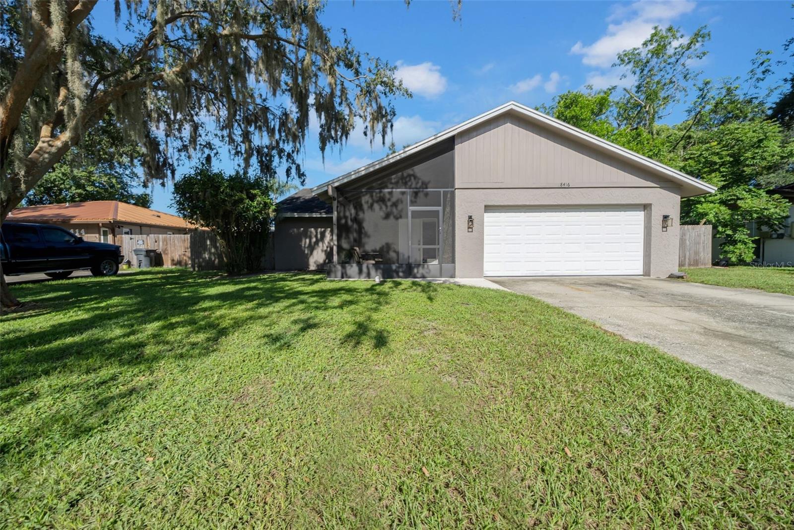 Welcome to 18416 Sterling Silver Circle in the quiet, well-kept Windmere subdivision of Lutz. This 3-bedroom, 2-bath pool home offers 1,725 square feet of comfortable, updated living space in a neighborhood where you’ll actually know your neighbors.
The heart of the home is the open, expanded kitchen—updated with modern finishes and designed so you can cook, chat, and be part of everything happening in the living area. The primary suite feels like its own private retreat with dual closets, a sitting area perfect for a TV or reading nook, and sliding glass doors that open straight out to the pool. Another bedroom also has direct access to the lanai, making it ideal for guests or a home office with a view.
Both bathrooms have been tastefully updated, and the flooring throughout the home has been refreshed. Step outside to the oversized screened lanai and pool area—plenty of space for relaxing, entertaining, or just enjoying Florida evenings without the mosquitoes.
If you’ve been looking for a move-in ready home in a peaceful setting, this one checks all the boxes.