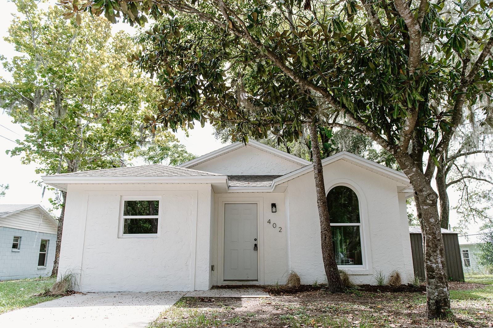 Welcome to this stunning 4-bedroom, 2-bathroom single-family home, perfectly located in the heart of Eustis. With 1,400 square feet of thoughtfully updated living space, this move-in-ready home combines modern upgrades with timeless comfort.
Step inside to discover luxury vinyl plank flooring throughout, offering both style and durability. The brand-new kitchen is a true centerpiece, featuring sleek cabinetry, modern finishes, and plenty of space for cooking and entertaining. Recent upgrades include all-new electrical wiring with a new breaker panel, brand-new ductwork, and a recently serviced HVAC system to keep you comfortable year-round. The roof and plumbing were updated in 2017, offering peace of mind for years to come.
Whether you're looking for extra space to work, host, or relax, this versatile layout is ready to suit your lifestyle. So, don’t miss this opportunity to own a beautifully renovated home with major system upgrades in a quiet, established Eustis neighborhood. Schedule your private tour today!