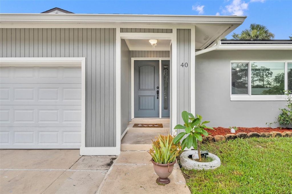 Photo of 40 Blare Drive, Palm Coast, FL 32137 (MLS # V4943654)