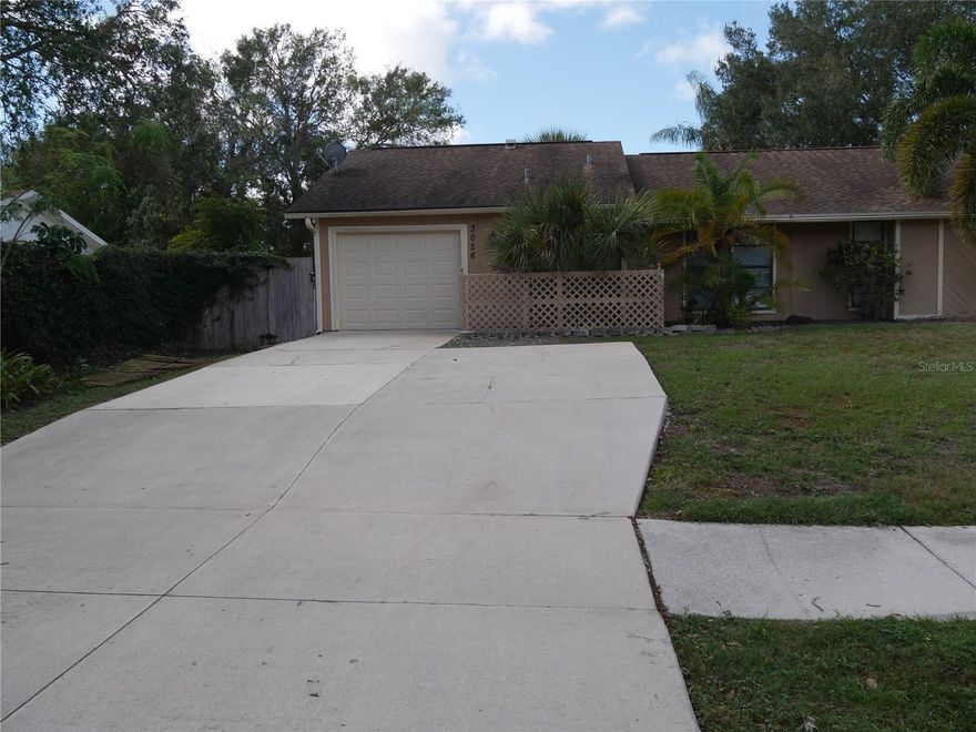 3/2 POOL HOUSE with a one-car garage!  Beautifully remodeled with exotic granite in kitchen and both baths, wood cabinets and crown molding in the kitchen, stainless appliances and an island with fantastic storage!  There is a shower/tub combination and a vessel sink and faucet in the Jack and Jill bath, shower in primary bath and a travertine vessel sink and vessel faucet.  There is large porcelain tile throughout the open floor plan along with a sparkling pool! Screened lanai too!  Rent price includes lawn care and pool care.   Sorry, no pets and no smoking permitted!