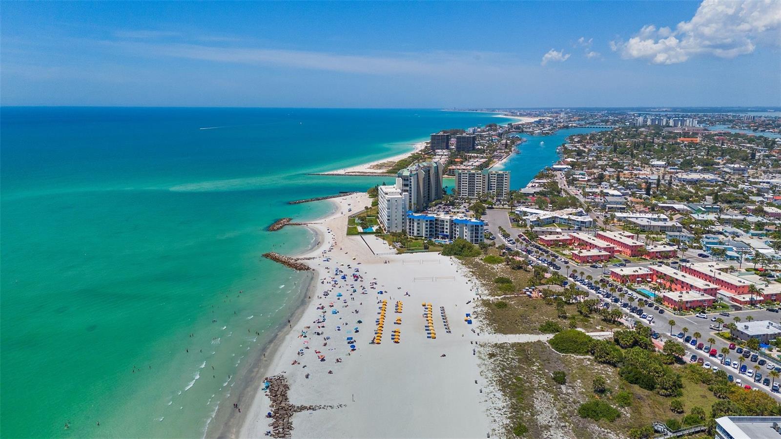 Rare opportunity to own this condominium just 1 block from Upham beach and the Gulf. The owner will accept a purchase or a lease purchase (rent to own...Move in now and Close on the purchase in a year!). Inquire for full details. Enjoy your winter retreat this winter and/or your all year round beach life sanctuary! Homes in this cozy, 14 unit, boutique condominium community here at Sunset Plaza East do not come available very often. And with this great price, purchase or lease purchase, and this most desirable “walk to all” beach community location, this is a rare find and a one-of-kind value. You won’t find a beach setting and price like this right across from the sugary white sands of the Gulf of Mexico (across Upham Beach) in St Pete Beach (Rated #1 Beach in the US!). There's nothing like it on the beach at this price! This top floor unit (#11) is move in ready, furnished with an open concept kitchen/dining area, and just a few steps walk to the beach, restaurants and beach nightlife. You can make this your Florida winter beach retreat, investment property or your full year beach home by the Sea. This surprisingly spacious, completely furnished beachy condo shows pride of ownership throughout with a new water heater, new stove, new Frig and Hurricane rated windows (no need for shutters!) The home has excellent natural light in the living area and in the full bedroom. There is a laundry facility on premises and an over-sized extra storage unit for all your beach toys! There is also a quiet outdoor seating/picnic area and shower behind the building. This home can comfortably sleep up to 4 adults with plenty of living room space for a day bed or sofa sleeper. You'll love the great fishing spot right across the street at Sunset Park. Enjoy the Sunday Market & Art Fairs of Corey Avenue and jump on a Free Beach golf cart ride day or night to quickly get up & down Gulf Blvd and all the activities the area has to offer. Downtown St Petersburg is only a 15 minute ride for more upscale restaurants, shopping, museums & the new Pier. And as a bonus, the monthly condo fee includes cable & internet. Make this your home, beach getaway or investment property. 3 month minimum on rentals. Live the Beach Life all year long! Just slip on your flip flops, step out of your front door and stroll a few steps to Upham beach, or one of the many local bars and restaurants where you can sip a margarita and listen to a few Jimmy Buffett tunes. It's ideally located to access all the beach amenities as well as a quick drive to Fort De Soto National Park, and Downtown St. Pete to visit cultural attractions. Come take a tour today!