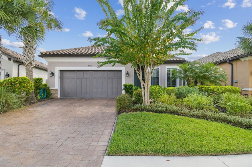 Luxury meets tranquility in this stunning home located in the exclusive GATED community of
Esplanade of Tampa!
Built by Taylor Morrison, this thoughtfully designed home combines timeless craftsmanship,
modern upgrades, and a true sense of privacy with its CUL-DE-SAC location and peaceful
CONSERVATION VIEWS.
Curb appeal shines from the moment you arrive, featuring FRESH EXTERIOR PAINT (2025), lush
landscaping, and a NEWLY SEALED brick paver driveway. Enjoy the convenience of INCLUDED
LAWN MAINTENANCE and NO CDD fees in one of the most desirable communities in New
Tampa!
Step inside to discover a beautiful and well maintained interior with HIGH-END TRAVERTINE
FLOORING throughout, plantation shutters, and custom Hunter Douglas roller shades. The open
and inviting floor plan offers 3 spacious bedrooms, an office/den with French doors, 3 full
bathrooms, and a 2-car garage with attic pulldown stairs and flooring for additional storage.
The entertaining kitchen impresses with GE Café series appliances, elegant cabinetry, thick granite
countertops, glass tile backsplash, a natural gas range and massive center island. The expansive
owner’s suite is a private retreat, offering a LARGE CUSTOM WALK-IN CLOSET WITH BUILT-INS, a
luxurious ensuite bathroom with dual vanities and a spacious walk-in shower. The large laundry room offers built in cabinetry for ample storage space and organization. 
Step through the sliding glass doors to your private backyard oasis, complete with a sparkling
PRIVATE POOL and SPA, brick paver pool deck, rescreened in 2023, and a FULLY FENCED YARD surrounded by lush
greenery and total PRIVACY. The covered lanai provides the perfect space for outdoor dining,
lounging, or simply unwinding while taking in the peaceful conservation views.
This home was designed for both comfort and quality, featuring a tankless gas water heater,
hurricane shutters, in-wall pest control, energy-efficient construction, and a TILE ROOF built to
stand the test of time.
Residents of Esplanade of Tampa enjoy access to premier resort-style amenities including tennis
and pickleball courts, two dog parks, a clubhouse with fitness center, community pool with
cabanas, social events, fire pit, and more, all with no age restrictions and no CDD fees!
Conveniently located near I-75, I-275, TOP-RATED MEDICAL FACILITIES, Wiregrass Mall, Tampa
Premium Outlets, The Grove, and some of Tampa Bay’s most popular dining and entertainment
destinations, this home offers the perfect blend of luxury, comfort, and convenience.
Why wait for new construction when this home offers all the luxury, upgrades, and tranquility of a
new build without the wait? Esplanade of Tampa is fully established and has a beautifully
maintained community ready to enjoy today.
This exquisite home is a true gem offering privacy, elegance, and the ultimate Florida lifestyle in
one of the most sought-after communities in the area.