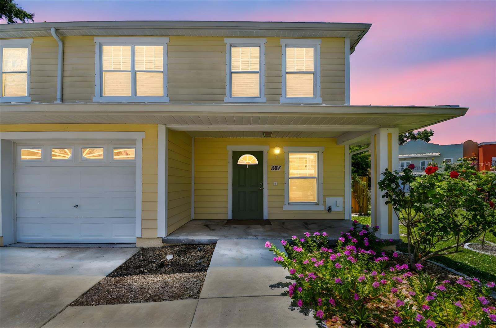 Welcome to 587 Shady Grove Drive, a beautifully maintained end-unit garage townhome offering the ideal blend of space and style along with a very desirable proximity to Downtown Dunedin. This spacious 4-bedroom, 2-bath home is located in the golf cart zone but is also just a short walk from charming Downtown Dunedin and the scenic Pinellas Trail. It is minutes from the white sands of Honeymoon Island and top-rated local schools as well. The first floor has a bright and inviting living and dining areas that flow effortlessly into a well-equipped refreshed kitchen with new appliances (2024), featuring abundant cabinet and counter space that are perfect for everyday meals or entertaining. The first floor also features a full bathroom, multiple storage closets, and access to the garage. Then step outside to your private backyard oasis complete with a brand-new fence (2025) and expansive paver patio (2025) surrounded by tropical plants making an ideal setting for weekend barbecues or relaxing evenings under the stars. Upstairs features 4 bedrooms and a bathroom with a freshly remodeled walk in shower (2025) and a laundry room with a new washer and dryer (2025). The light-filled primary bedroom will easily accommodate a king size bed while the versatile secondary bedrooms offer flexible living options for use as family and guest bedrooms or even a home office. As an end-unit, the property also boasts a side common area and an extended driveway for additional parking, adding both space and convenience rarely found in townhome living in this desirable location. Enjoy easy access to nearby shops, restaurants, beaches, parks, and more - everything that makes Dunedin one of the most livable and vibrant communities on Florida's Gulf Coast. Available now - don't miss this opportunity! Schedule your private showing today and experience the lifestyle you've been looking for.