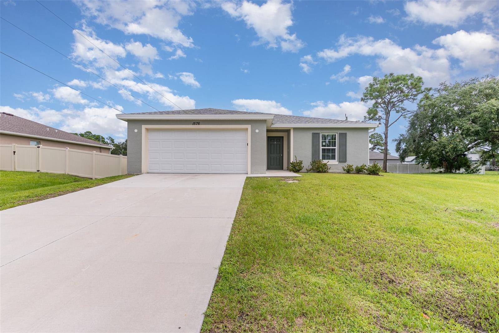 Built in 2021, this one-story, 4-bedroom, 2-bathroom single-family home offers modern comfort and convenience. The open layout features tile flooring throughout the common areas for easy maintenance, while the bedrooms are carpeted for added warmth and comfort. The kitchen flows seamlessly into the living and dining spaces, making it perfect for everyday living and entertaining. A spacious 2-car garage provides ample storage and parking. Move-in ready and thoughtfully designed, this home blends style and functionality.