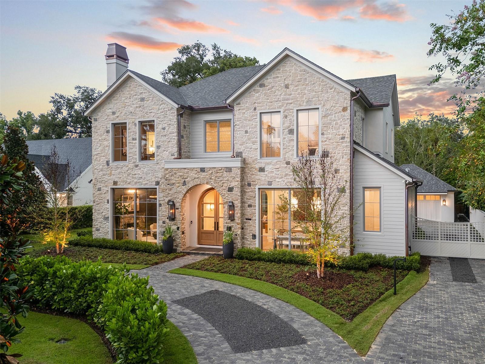 PROUDLY PRESENTING THE WINTER PARK VIA's NEWEST ADDITION TO THE LUXURY HOME MARKET ...BUILT BY M. LAHR HOMES! Prominently sited on a fantastic lot, this custom home has come together perfectly as a unique, awe-inspiring estate offering an unparalleled combination of function, elegance, and aesthetics. The home boasts a very well thought out design with finishes and features that showcase professional design planning at a very high level. There is even more detail, function, and quality than what is typically available in the Winter Park New Construction market. Offering a great combination of an expansive living area, large bedrooms, and unique spaces accented by three (3) feature fireplaces, the house feels nothing less than a resort. Expansive glass from the oversized doors and windows flood the home with natural light and create a dramatic exterior evening presentation. The entire main floor living area opens perfectly out to the large covered patio, back yard, and the pool/spa area making this entire area a beautiful four (4) season extension of the interior living space. The floor plan features a private ground floor primary suite, four (4) additional large bedrooms (all with private baths and walk-in closets), and numerous sitting areas/loft/dining spaces that can be utilized to suit multiple needs! Please see floor plans attached and CLICK ON TOUR LINK FOR A COMPREHENSIVE VIDEO WALK THROUGH . You will not find a better opportunity to secure a highly detailed, unique, luxury home in the WP area that offers the feel, presentation, and function of 1229 Via Del Mar. Located in the desirable Winter Park Via's location in top rated Dommerich/Winter Park School District and minutes to WP Raquet Club, Park Ave. Shopping, Winter Park Village, DT Orlando, Advent Health, ORMC and more. An exquisite Luxury Estate in one of Central Florida's most dynamic areas!