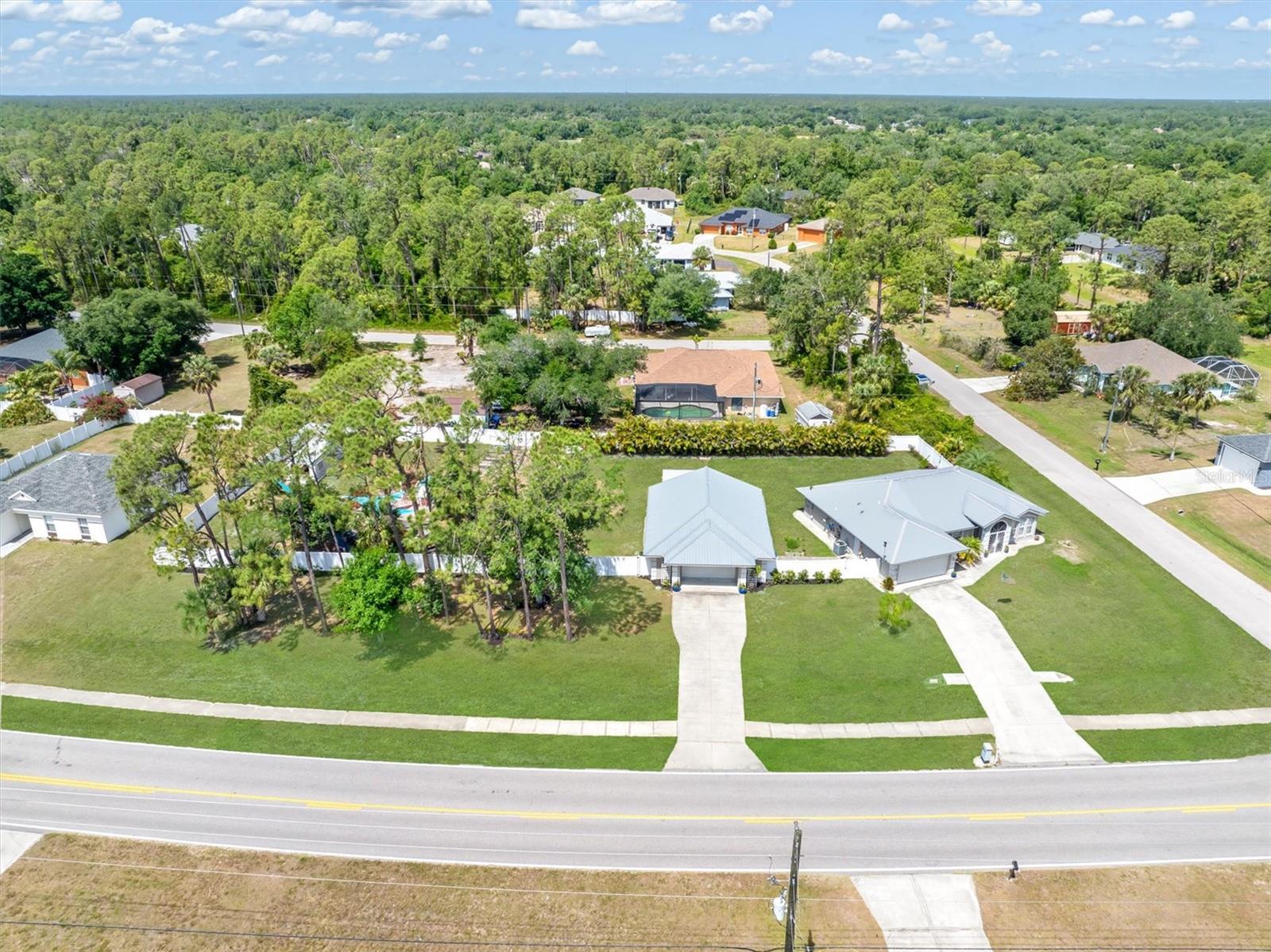 Smart Homestead on 3 Private Lots! Completely updated and MOVE-IN READY!
Welcome to 2411 Atwater Drive in North Port – where smart technology, modern luxury, and the ultimate homestead lifestyle collide! Nestled on three oversized, completely fenced lots (over 30,000 sq ft!), this completely updated, move-in-ready 3-bedroom, 2-bathroom home is your ticket to privacy, space, and convenience. Plus, it’s in the highly coveted X Flood Zone, with a metal roof, NO HOA, and city water!
Step inside this smart home that’s loaded with high-tech features to make your life easier. Control your thermostat, lighting, security system, and even know when your Amazon packages arrive with the smart mailbox.
The heart of this home? A chef’s kitchen that will have you cooking like a pro! Featuring a top-of-the-line Bertazzoni induction range and sleek Fotile range hood, this kitchen is designed for serious culinary action. Add in granite countertops, custom cabinetry, and modern appliances, and you’ve got the perfect place to whip up your favorite meals.
But it gets even better… Outdoor enthusiasts will love the 1,200 sq ft temperature-controlled building, perfect for anything from a workshop to an art studio to a guest house. Plus, it has its own electric meter – how cool is that? ??
Embrace your inner gardener with a fully functional greenhouse that’s ready for year-round plant life, and a chicken coop to supply you with fresh eggs (yes, the chickens are included if you'd like them to stay!).
Inside, the split-bedroom layout creates the perfect balance of privacy and space. The owner’s suite is spacious and relaxing, with a walk-in closet and a private bath that feels like a spa retreat.
Features that make this home stand out:
3 oversized lots for ultimate privacy and room to grow
Smart home tech including a smart mailbox for package tracking
Chef’s kitchen with Bertazzoni range & Fotile hood
1,200 sq ft temperature-controlled building with its own electric meter
Greenhouse, chicken coop, and space for RV/boat parking
Flood Zone X and no HOA
Ready to embrace the modern Florida homestead lifestyle? Schedule your showing today and step into a world where privacy, technology, and a self-sufficient lifestyle come together seamlessly.