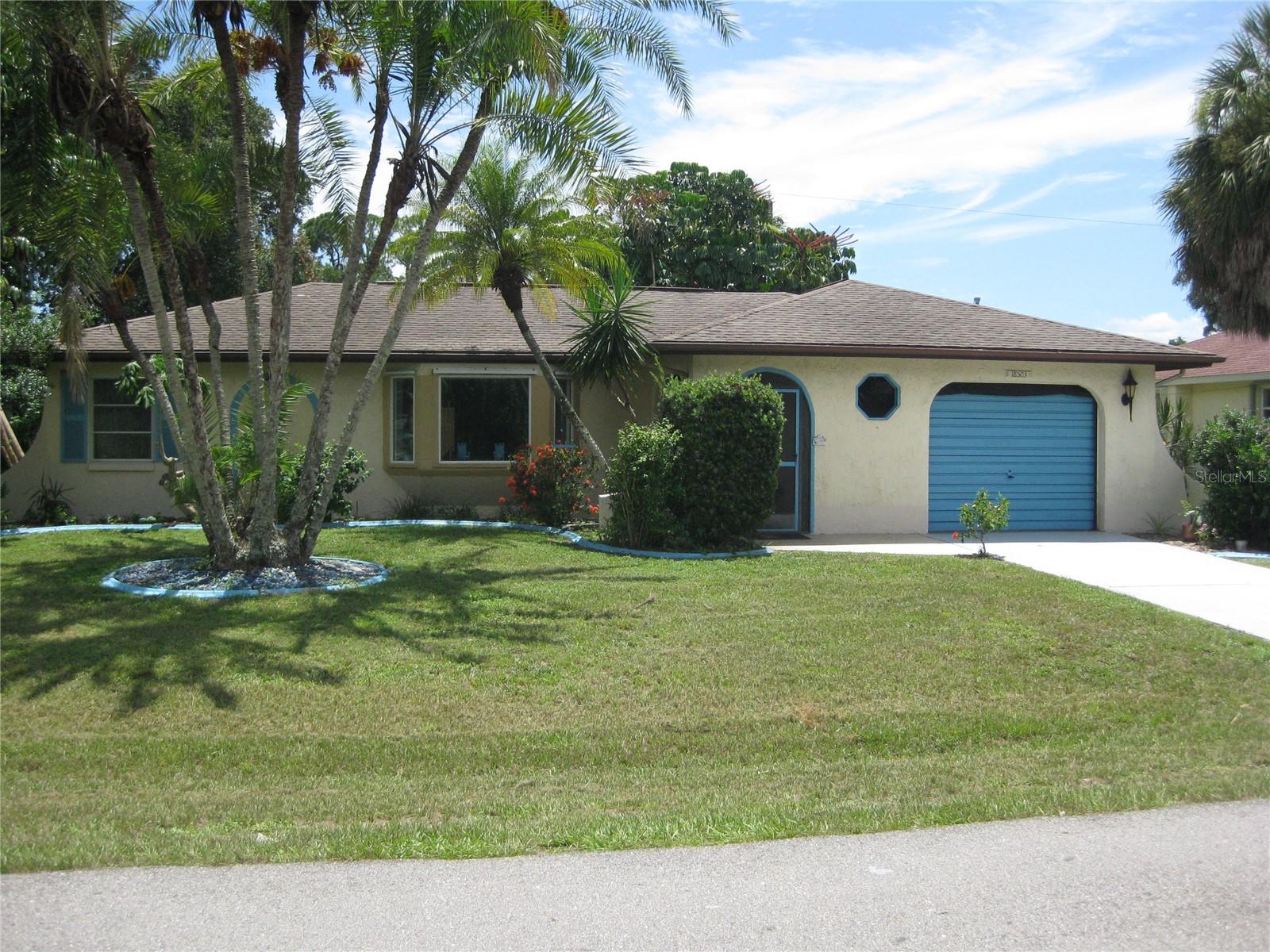This well-maintained home in a quiet, convenient Port Charlotte location is near shopping and hospitals. The home has a beach-like Florida feeling as the walls of the living room and into the kitchen are a nautical mural. The kitchen has granite and stainless steel appliances. The roof is from 2022 (after hurricane Ian), the septic tank as well as the drainage field was replaced in April 2025. The air conditioner is 5 years old and the house had a complete re-pipe in 2021. The square footage is 1561. It features a 1 and ½ car garage. The home is on a corner lot, so there is enough room to put a large size pool. The home comes with all furniture and household items, such as dishes, towels, kitchen appliances and is move in ready. There is a washer and dryer in the garage.