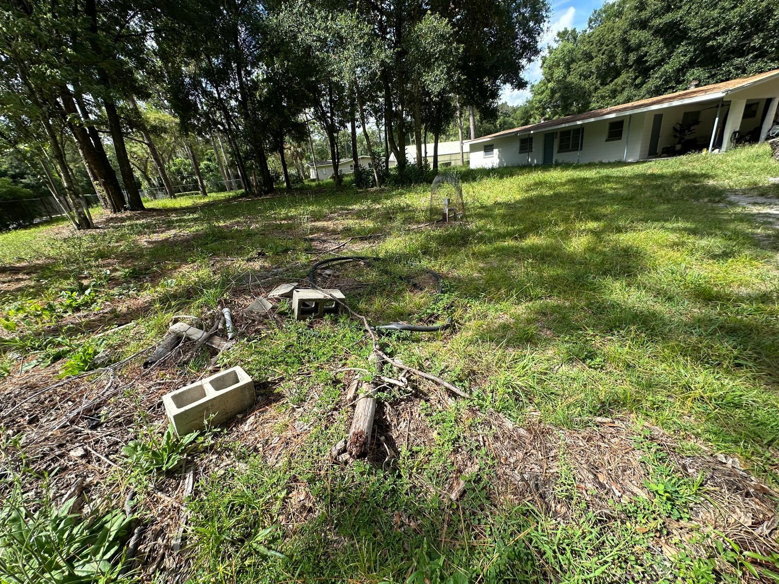 Central Florida Home close to all amenities! No HOA! This charming 3 bedroom/2 bath block home is located on 1.36± fenced acres set back from the road for privacy and country feel. Plenty of parking for an RV or Boat. 1,450± sf living area with a front porch and an attached carport. Property is completely chain link fenced. Close to SR 436/SR 441. Just 2 miles to Wekiwa Springs State.