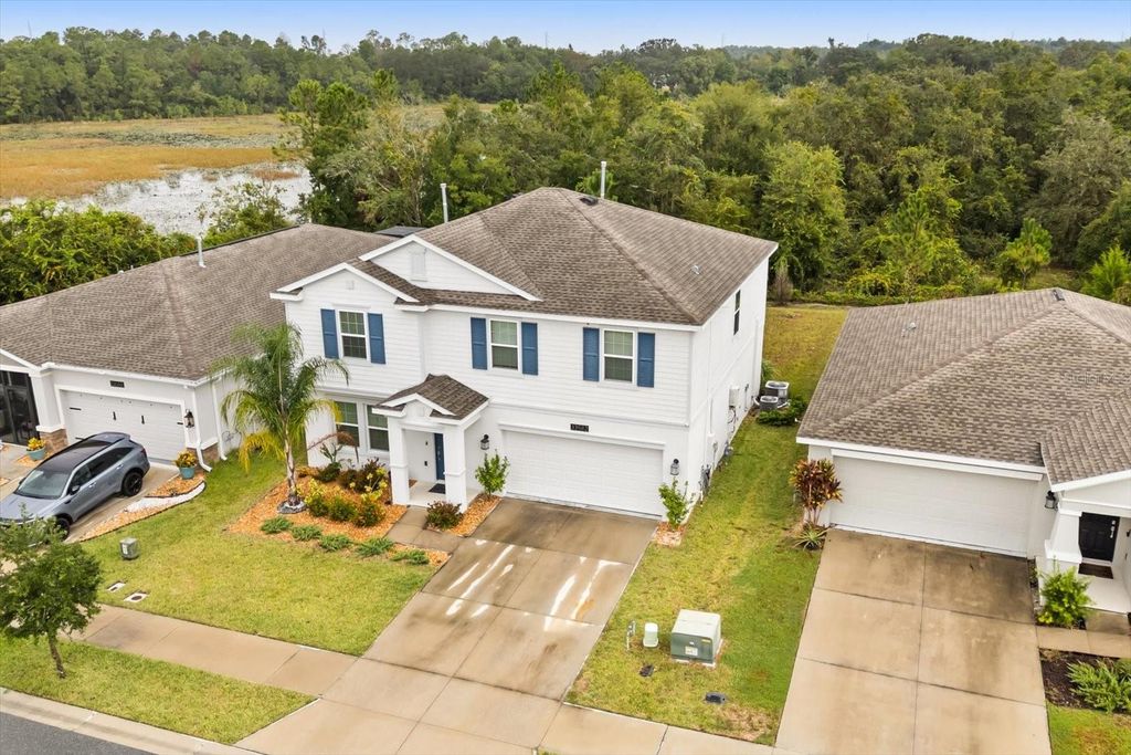 Photo of 33582 Sky Blossom Circle, Leesburg, FL 34788 (MLS # G5102968)