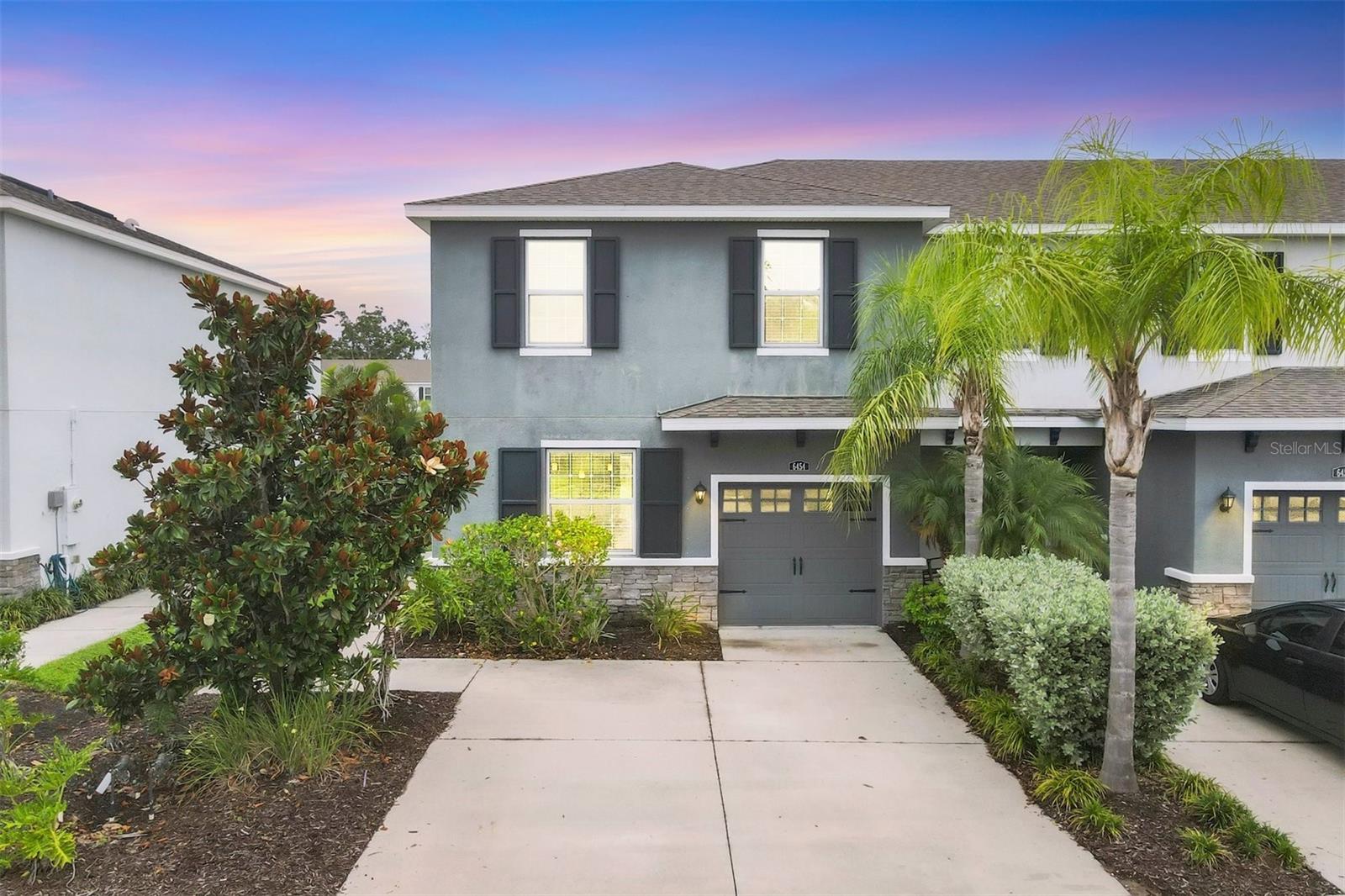 Welcome to Baytown Square, a gated and maintenance-free community offering comfort, convenience, and an exceptional Sarasota location. This thoughtfully designed two-story end-unit offers more interior light and additional square footage than interior units. This townhome features 3 bedrooms, 2.5 bathrooms, and a 1-car garage. The open-concept main level boasts high ceilings, elegant tile flooring, and a modern kitchen equipped with granite countertops, stainless steel appliances, and a breakfast bar. A covered and screened lanai provides a peaceful retreat overlooking lush greenery including a fountain view. Upstairs, the spacious primary suite includes a walk-in closet and a spa-like ensuite bath with dual vanities and a walk-in shower. Two additional bedrooms, a full guest bath, and a convenient laundry room complete the second floor. The pet-friendly community offers a heated resort-style pool, gated entry, and beautifully landscaped common areas. With a low monthly HOA fee of $227 covering gate access, landscaping, and amenities, plus no CDD fees, this property is ideal as a primary residence, seasonal home, or income-producing investment. Conveniently located just off I-75 with no road noise, and only minutes from University Town Center, downtown Sarasota, renowned Gulf beaches, top-rated schools, golf courses, and scenic parks. Flexible leasing policy with no ownership waiting period. Don’t miss the opportunity to enjoy the best of Sarasota living.