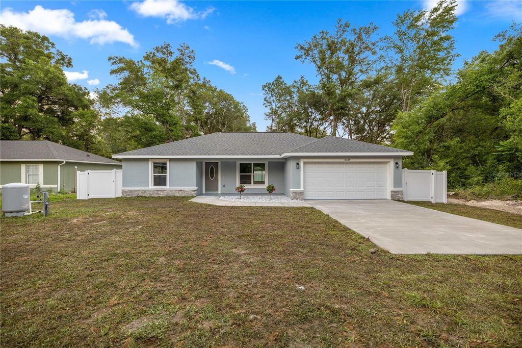 Photo of 14089 SE 34th Terrace, Summerfield, FL 34491 (MLS # OM722563)
