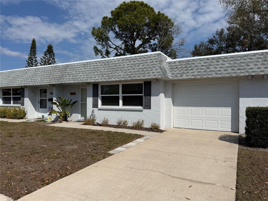 Like New/Fully Renovated top-to-bottom custom condominium in the desirable 55+ community of Rothmoor Estates - High And Dry / NON-Flood, NON-Evac Zone. This community is very conveniently centrally located, and within walking distance to all of your shopping establishments, along wtih walking distance to the Largo Recreation Center with an amazing fitness facility and pool, as well as, the Largo Scenic Nature Park (easy-peasy way to get your steps in, and is all wheelchair accessible). This is a very rare find with an ATTACHED 1 Car Garage, providing plenty of storage and easy grocery unloading even in the tropical rains). This BEAUTIFUL 1 Bed/2 Bath condo comes mostly furnished with brand new furnishings as well. You will absolutely love the attention to detail on this professionally renovated home including luxury vinly flooring throughout, 6" baseboards, neutral paint, custom cabinetry in the kitchen and baths, stone countertops, stainless steel appliances, recessed lighting & ceiling fans througout, and Impact/Storm rated doors and windows! You will also love the private back patio to enjoy quiet mornings or evenings next to your favorite potted plants or garden and grill (not included). The community amenities of this quaint/very low traffic community include a wonderful lap pool, clubhouse, exterior maintenance, cable, internet, water, sewer and trash (all included). Located just a few miles from teh world-famous beaches of Clearwater and Indian Rocks, along with the Tampa airport only 30 minutes away, and the St. Pete/Clearwater airport only 20 minutes away. Don't let this wonderful opportunity get away, call today!!