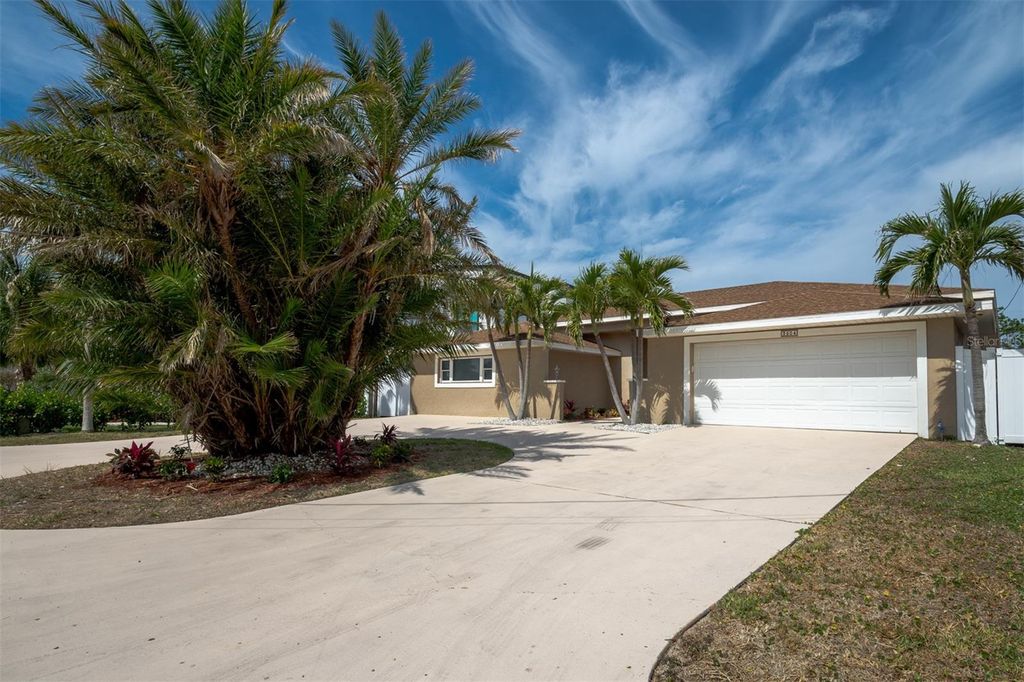 Photo of 2504 Hibiscus Drive W, Belleair Beach, FL 33786 (MLS # O6325957)