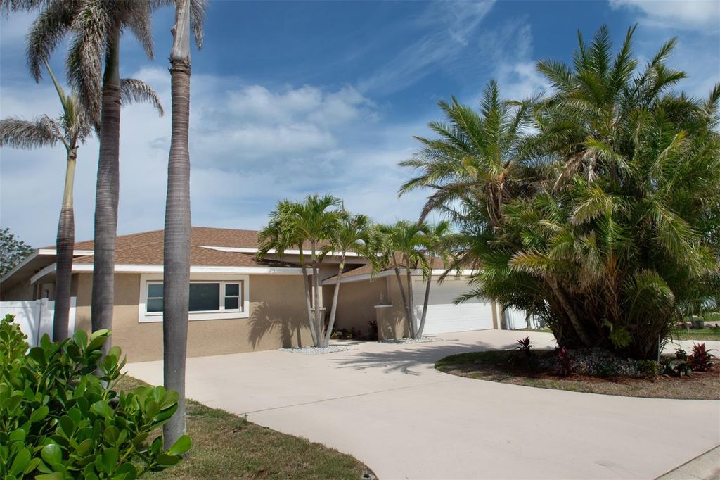 Photo of 2504 Hibiscus Drive W, Belleair Beach, FL 33786 (MLS # O6325957)