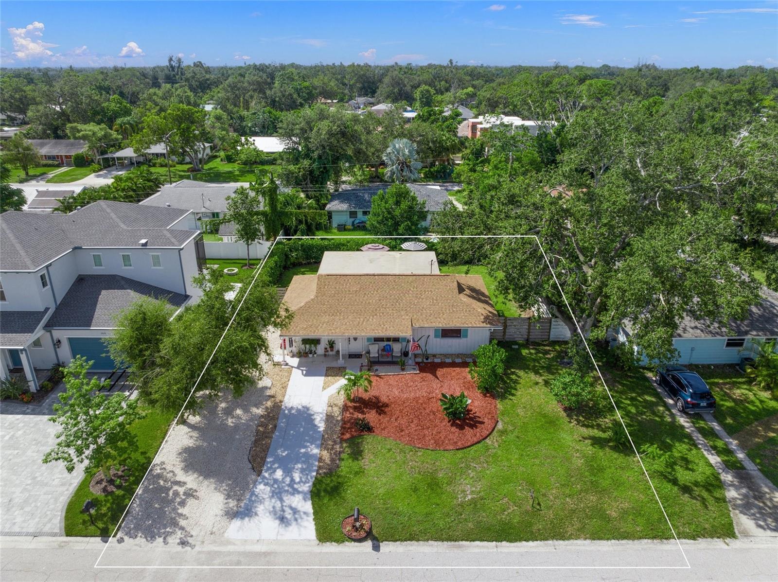 This is the one * QUALITY BUILT & IMPECCABLY MAINTAINED * PRIDE OF OWNERSHIP SHOWS * NEW ROOF 2024 * NEW Lovingly Renovated Spa-style Bathroom in 2025 (it was taken down to the studs and is gorgeous) * NEW A/C DUCTWORK THROUGHOUT in 2025 * NEW Double Oven & NEW Refrigerator in 2025 * This IMMACULATE home is Centrally Located in the Paver Park neighborhood * Your bright Chef's Kitchen includes Stainless Steel Appliances, Shaker Style Cabinets with Soft-close Drawers & Beautiful Granite Countertops * This Kitchen is a SHOWSTOPPER with a classic, timeless design * Tongue & Groove Ceiling in the Dining Room * ALL Bedrooms feature NEWER Panel Entry and Closet Doors * The OVERSIZED Screened Lanai is 20x19 with a BEAUTIFULY LANDSCAPED BACKYARD & Paver Patio * NEW EPOXY FLOORING ON LANAI in 2025 * This is the perfect home to entertain family & guests or for simply relaxing in your slice of paradise * NOTABLE UPDATES INCLUDE: an additional driveway for parking; Luxury Vinyl Flooring and Tile Flooring (no carpet!); 8" Baseboards; Crown Molding; and HURRICANE + STORM PROTECTION with CLEAR HURRICANE SHUTTERS * Paver Park is located in a great school district * You're minutes to Payne Park, The Legacy Trail, Downtown & the Bayfront, Selby Botanical Gardens, Siesta Key, St Armand's Circle & Lido Beach! * This is an EXCELLENT YEAR ROUND HOME or WINTER GETAWAY * One look & you'll see why this INCREDIBLE HOME stands out in this market *