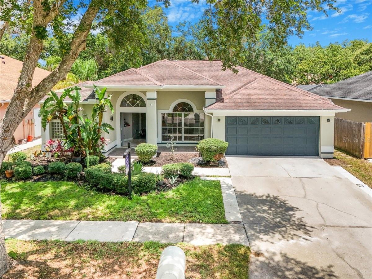 Exceptional 4-Bedroom, 3-Bathroom Home in desirable Cypress Meadows
Welcome to this beautifully updated and spacious 4-bedroom, 3-bathroom home located in the coveted Cypress Meadows community. This stunning one-story home boasts several appealing features including:
*Open Living Space: The layout seamlessly connects the kitchen, family room (with fireplace), bonus room, and office, creating a spacious, inviting area for both relaxation and entertainment.
*Granite Countertops: The kitchen is equipped with beautiful granite countertops, adding a touch of elegance and providing plenty of space for meal preparation and storage.
*Private Backyard: The home offers a fenced backyard, ensuring privacy for outdoor activities or relaxation.
*Master Suite: The vast master suite is a standout feature, complete with a large walk-in closet and a full, tiled bath for a spa-like experience.
*Versatile Bedrooms: The three additional spacious bedrooms are located on the opposite side of the home from the master, offering privacy and comfort.
*Two-Car Garage: The two-car garage provides ample space for vehicles and additional storage needs.
*Prime Location: Conveniently located near shopping, schools, downtown, and MacDill AFB, offering both accessibility and privacy.
As you enter, you'll be greeted by an open and inviting living space that seamlessly blends the kitchen, family room (complete with a cozy fireplace), and a versatile bonus room. The separate office provides an ideal space for remote work or study. Enjoy relaxing moments in the bright sitting area, overlooking the serene lanai and private backyard.
The kitchen is a chef's dream with ample storage and gorgeous granite countertops, perfect for preparing your favorite meals. The large master suite offers a peaceful retreat, featuring a spacious walk-in closet and a full en-suite bath with elegant tile finishes. On the opposite side of the home, you'll find three generously sized bedrooms, ensuring privacy and comfort for everyone.
The fenced backyard offers a tranquil setting for outdoor gatherings or relaxation, while the two-car garage provides plenty of storage space in addition to room for your vehicles. With convenient proximity to shopping, schools, downtown, and MacDill AFB, this home is ideally located for both relaxation and convenience.
Don't miss your chance to own this gem in Cypress Meadows – schedule a showing today!