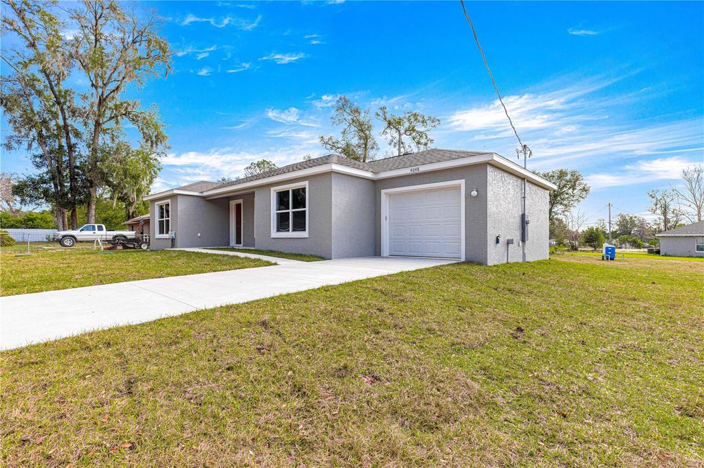 Photo of 46 Guava Pass Terrace, Ocklawaha, FL 32179 (MLS # OM699687)