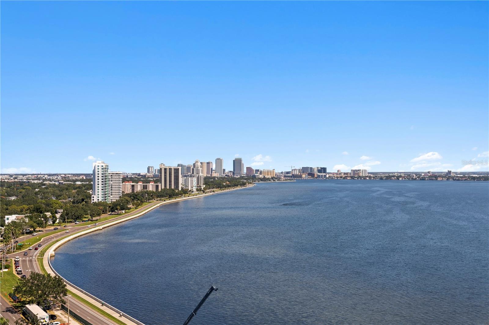 BEAUTIFULLY RENOVATED Monte Carlo Towers BALCONY unit offering 2,007 sq. ft. with 3 bedrooms and 3 bathrooms, showcasing BREATHTAKING VIEWS of Tampa Bay, Hillsborough Bay, Downtown Tampa, and incredible SUNRISES & SUNSETS! Gorgeous elevator lobby and elegant double-door entry welcome you to a spacious foyer with tile flooring that continues throughout the unit. The STUNNING KITCHEN features custom solid wood raised-panel cabinetry, granite countertops, stone backsplash, under-cabinet lighting, stainless steel appliances, recessed lighting, a large center island with extra storage and beverage refrigerator, walk-in pantry, and private trash chute. Expansive living areas boast floor-to-ceiling windows leading to your PRIVATE BALCONY overlooking the Bay and Downtown skyline! Wake up to captivating sunsets over Hillsborough Bay from the PRIMARY SUITE with ensuite bath featuring dual sinks, granite counters, walk-in shower with bench seating & hidden niches, private water closet, and large walk-in closet. The SECOND BEDROOM enjoys spectacular Tampa Bay views, walk-in closet, additional storage, and a full bath just outside the door. The THIRD BEDROOM/2nd PRIMARY also has amazing views and includes an ensuite with tub/shower, single sink and walk-in closet! This exceptional unit also includes HURRICANE SHUTTERS, interior laundry room and two storage areas. Monte Carlo Towers offers resort style amenities: a 24,000 SF marble lobby, 24-hour concierge, two guest suites, heated pool, grilling area, social room with commercial kitchen, library, fitness center with saunas, and tennis/pickleball courts. Located in a top-rated school district and just minutes to Downtown, Hyde Park, SOHO, Riverwalk, and Tampa International/St. Pete Clearwater Airports, easy access to major highways, including I-275, I-4, and the Selmon Expressway with the nation’s longest continuous sidewalk right outside your door. Experience elevated living at its best—schedule your private tour today!