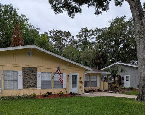 Photo of 21 Country Club Drive #A, New Smyrna Beach, FL 32168 (MLS # V4948680)