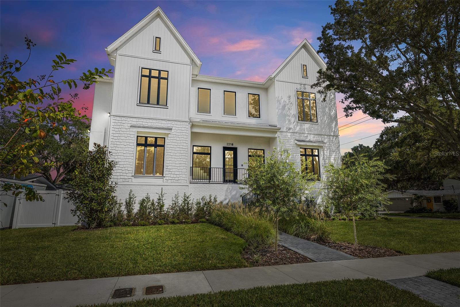 New Construction! Welcome to your Milana Custom Home - a breathtaking 2-story masterpiece that seamlessly blends modern design with timeless elegance. With 5 bedrooms, 5 full baths, and 2 half baths, this home offers an unmatched level of luxury and craftsmanship. As you step inside, you're greeted by a Venetian plaster foyer, setting the tone for the elegance that follows. The home features Level 4 drywall for a smooth, high-end finish, custom trim and beams throughout, and sleek linear AC vents that maintain the clean aesthetic. The main floor boasts a luxurious master bedroom suite, offering both convenience and privacy. The heart of the home is a gourmet kitchen with an expansive island, Taj Mahal honed quartzite countertops, and a spacious pantry, flowing effortlessly into the great room, which features a cozy fireplace -perfect for entertaining. In addition, there is a temperature-controlled wine room to preserve your finest vintages, a private study, and an elegant dining room, catering to both work and formal gatherings. The solid oak tread staircase leads you to the second floor, where you'll find four bedrooms, each with its own walk-in closet and ensuite bath, offering ultimate comfort and privacy for family or guests. The second floor also features a bonus room for movie nights or casual lounging, as well as the convenience of an upstairs laundry room. Step outside to your own private paradise, featuring an oversized pool and spa with a linear fire feature, a fully-equipped outdoor kitchen, and a spacious lanai for alfresco dining and entertainment. A covered balcony on the second floor provides even more space to relax and enjoy the outdoors. This meticulously designed home offers a lifestyle of unparalleled luxury and convenience. Don't miss your opportunity to make this exceptional property your forever home - call today for a private tour.