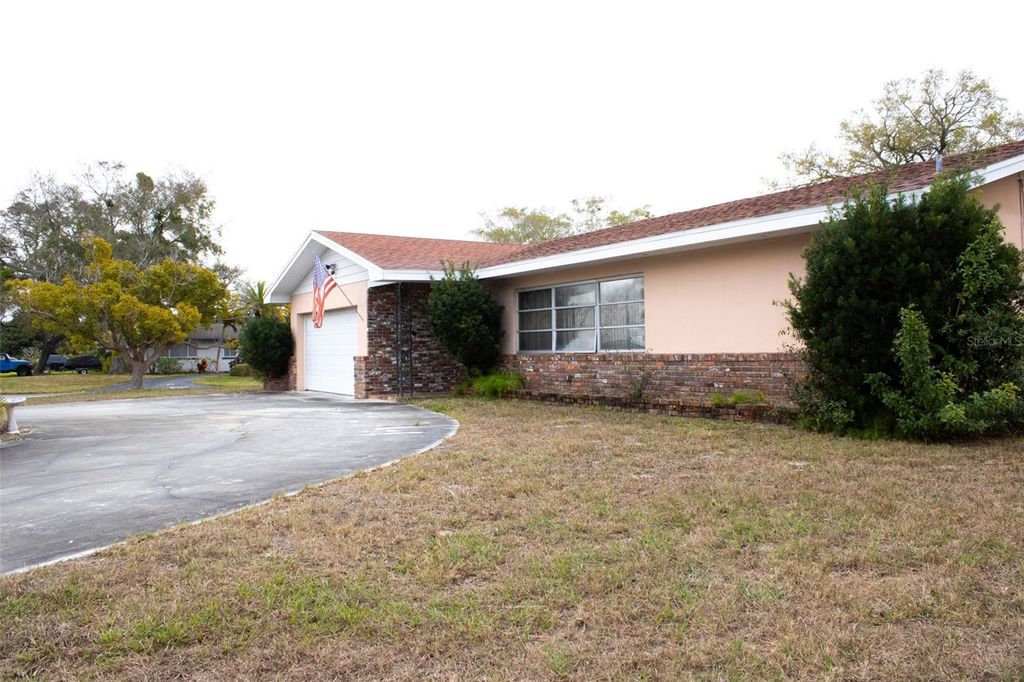 Photo of 201 Harbor Bluff Drive, Largo, FL 33770 (MLS # TB8487404)